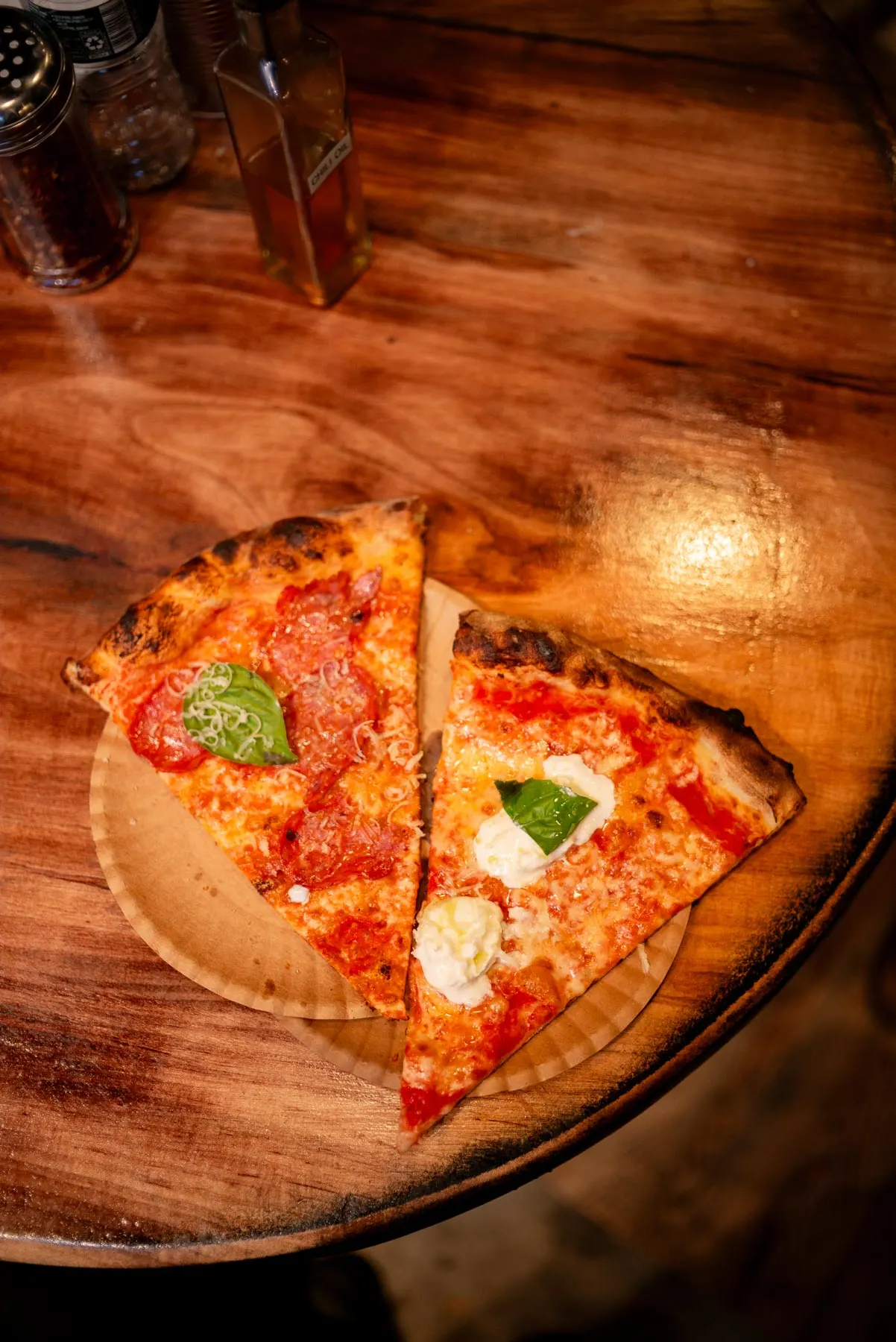 Burrata slice, classic pepperoni slice from L'Industrie Pizza New York City