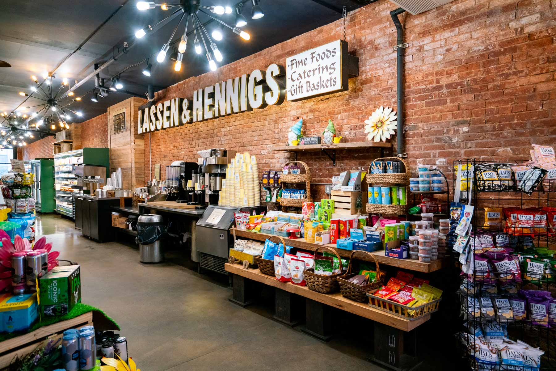 Stocked shelves and coffee counter at Lassen & Hennigs