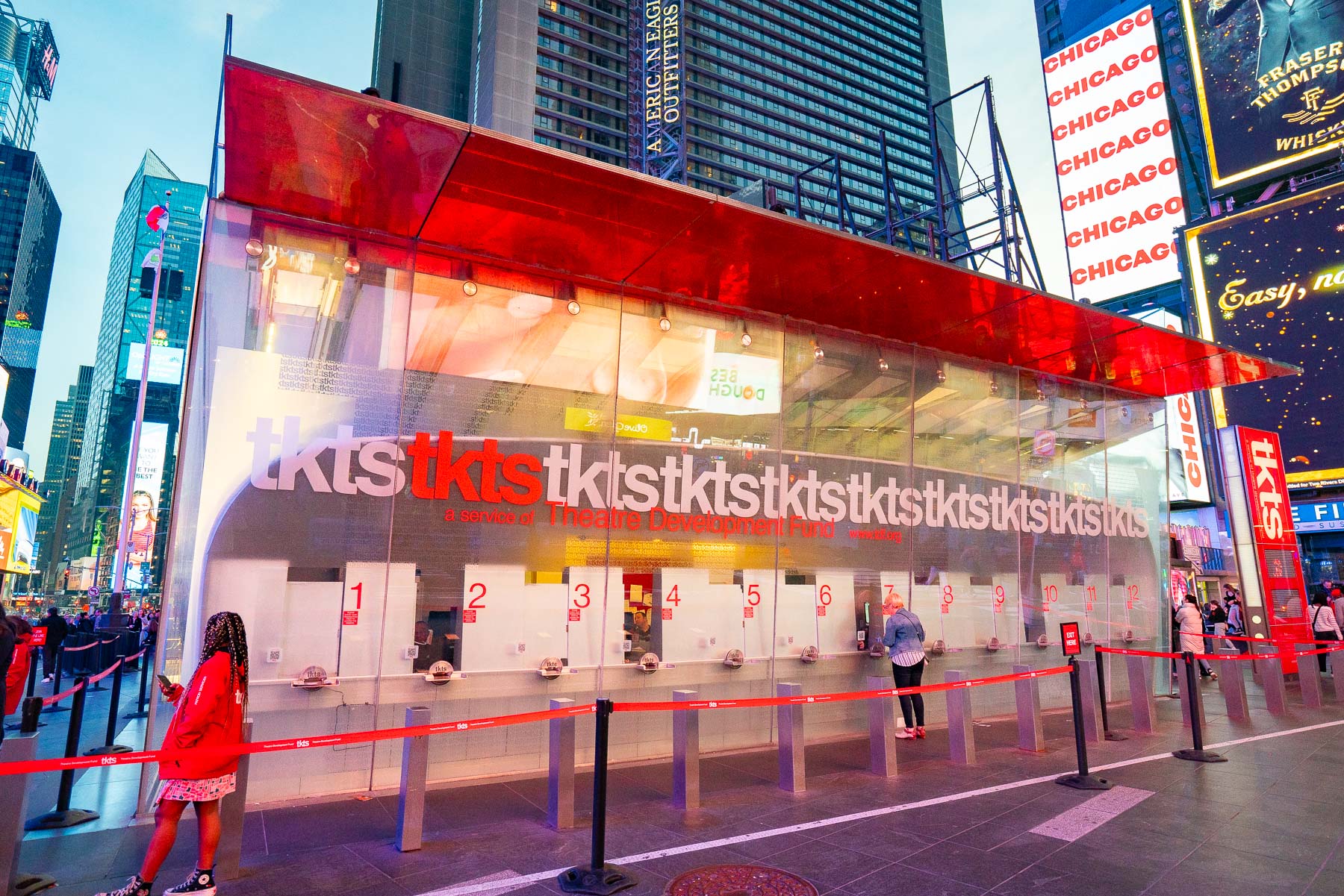 The TKTS Ticket Booth in Times Square at night, TKTS Ticket Booth Guide