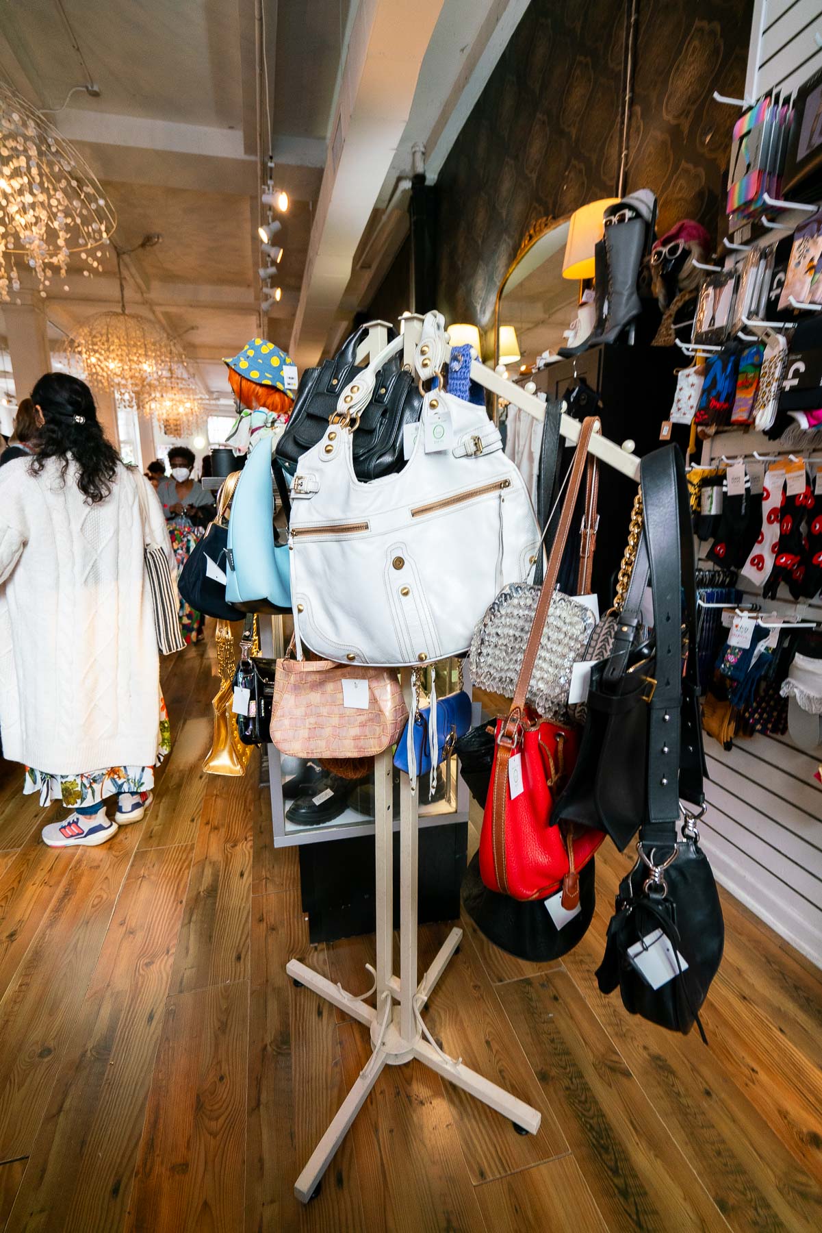 A stand of second-hand purses and bags at Beacon's Closet