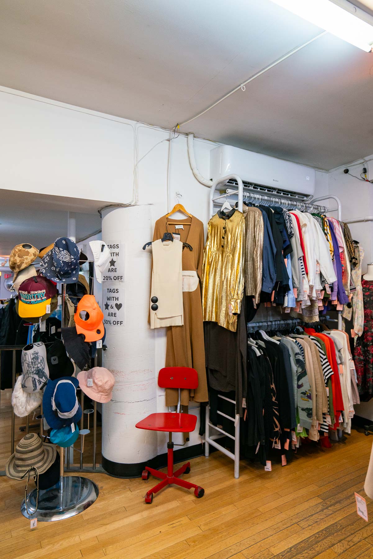 Hat and clothing racks at Tokio 7 Vintage in the East Village, one of the best thrift stores in New York City